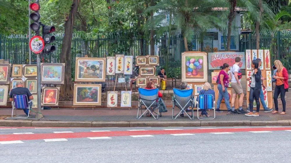 Local artists selling their work at an art fair.