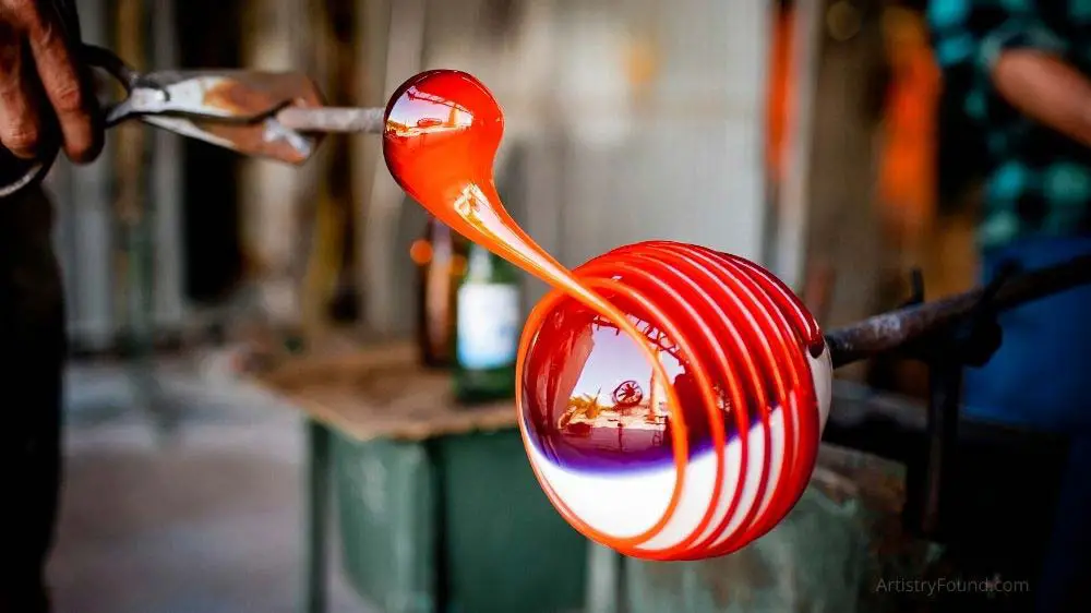 Local artist blowing glass.